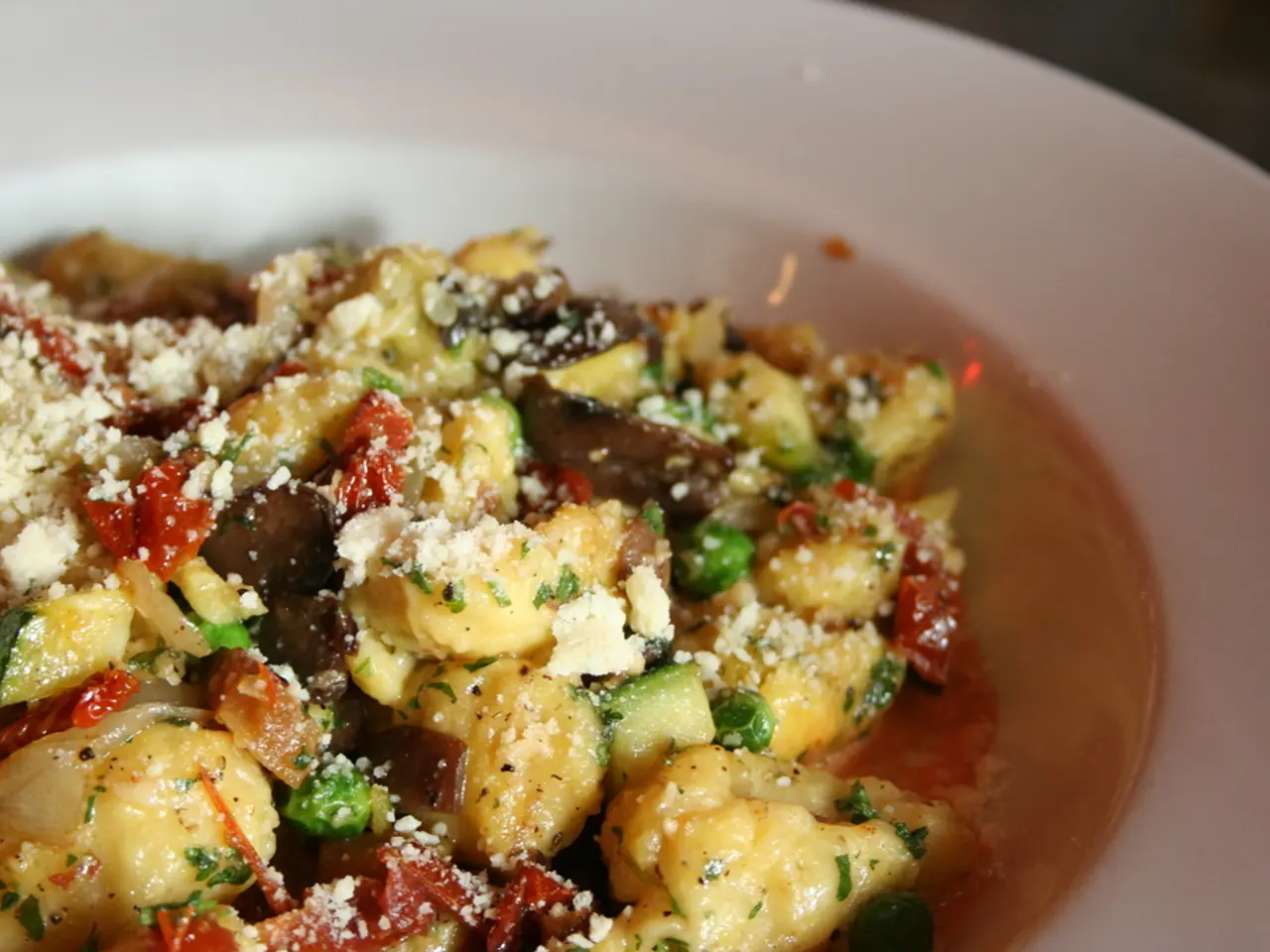 In the center of this picture we can see a white color palette containing some food items.