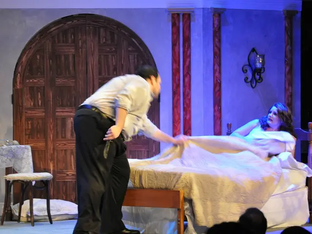 In this image I can see a man standing and holding a knife in his hand. In front of him there is a...