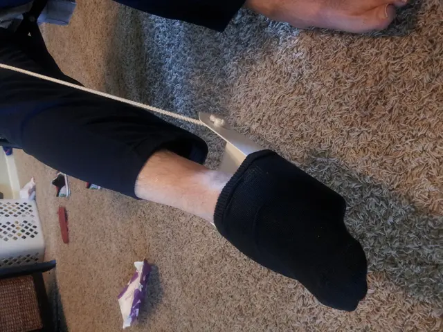 In the image in the center, we can see two legs. In the background there is a table, basket, one...